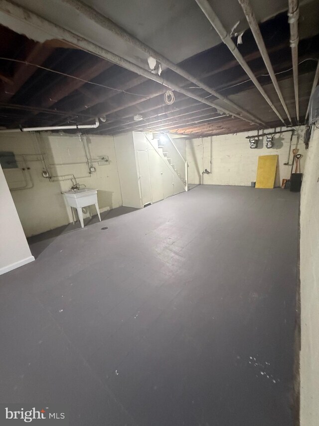 1113 Faunce St, Philadelphia, PA 19111 - unfinished basement featuring a sink