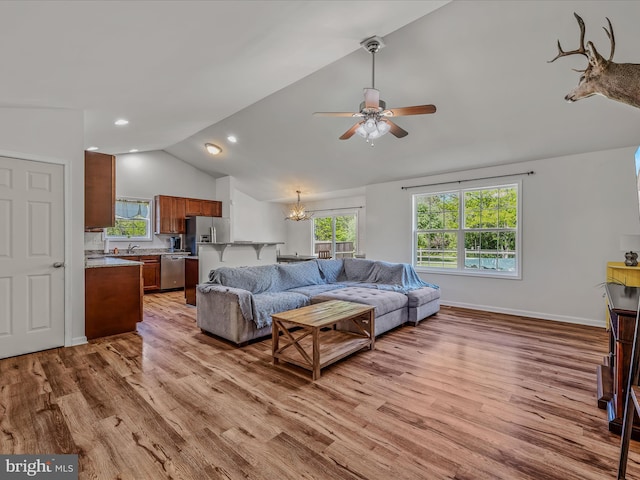 326 Soldier Dr, Bunker Hill, WV 25413 - living area featuring lofted ceiling, ceiling fan, light wood-type flooring, plenty of natural light, and recessed lighting