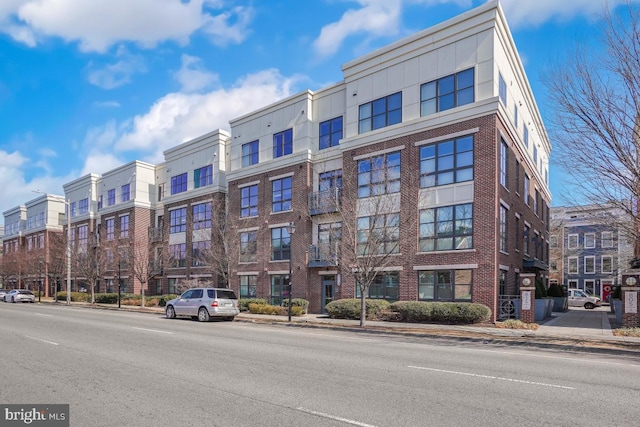 view of building exterior with a residential view