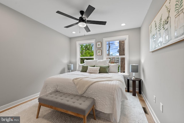 bedroom featuring baseboards, recessed lighting, and a ceiling fan