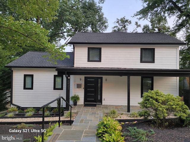2432 S Culpeper St, Arlington, VA 22206 - view of front facade featuring roof with shingles