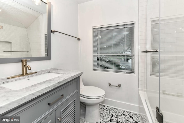2432 S Culpeper St, Arlington, VA 22206 - bathroom with tile patterned flooring, toilet, vanity, baseboards, and shower / washtub combination