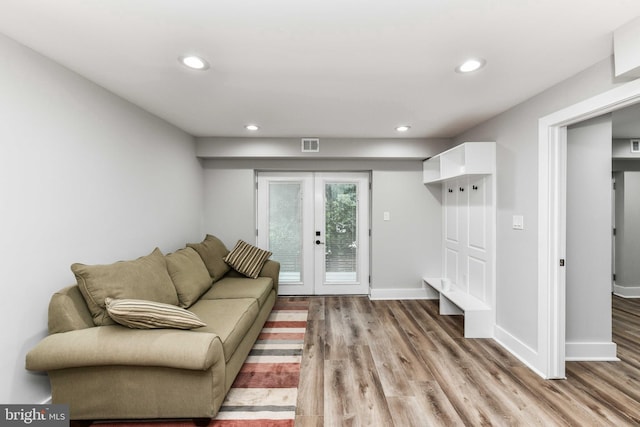 2432 S Culpeper St, Arlington, VA 22206 - living room with french doors, light wood-style flooring, recessed lighting, and baseboards