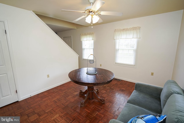 20560 Nanticoke Rd, Nanticoke, MD 21840 - living area featuring ceiling fan, baseboards, and stairs