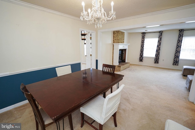 20560 Nanticoke Rd, Nanticoke, MD 21840 - dining area with crown molding, a chandelier, light carpet, a brick fireplace, and baseboards