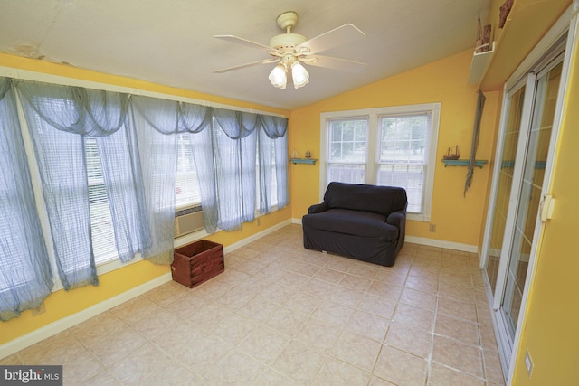 20560 Nanticoke Rd, Nanticoke, MD 21840 - living area featuring healthy amount of natural light, a ceiling fan, lofted ceiling, and baseboards