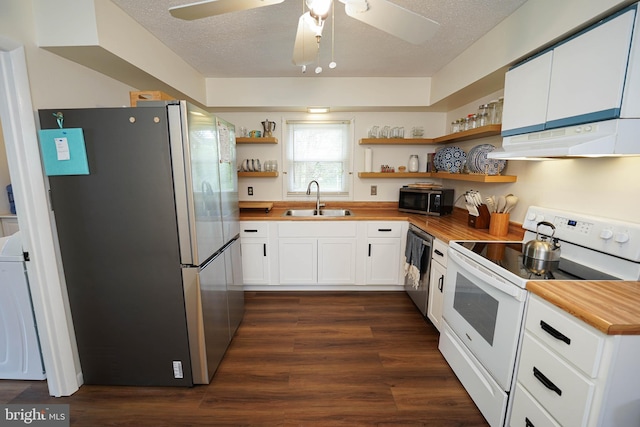 20560 Nanticoke Rd, Nanticoke, MD 21840 - kitchen featuring stainless steel appliances, under cabinet range hood, a sink, open shelves, and washer / clothes dryer