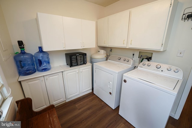20560 Nanticoke Rd, Nanticoke, MD 21840 - washroom with cabinet space, washing machine and clothes dryer, and dark wood-type flooring