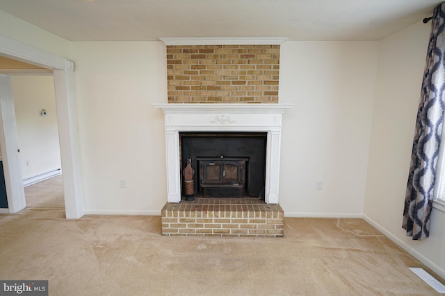 20560 Nanticoke Rd, Nanticoke, MD 21840 - detailed view of carpet, a wood stove, baseboard heating, and baseboards