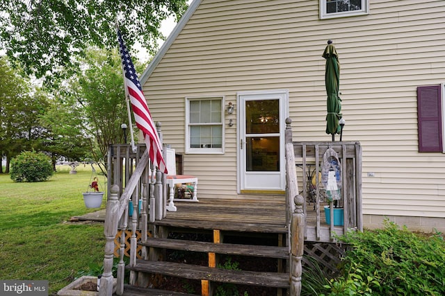 20560 Nanticoke Rd, Nanticoke, MD 21840 - property entrance with a wooden deck and a yard