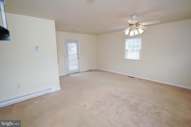 20560 Nanticoke Rd, Nanticoke, MD 21840 - spare room with a baseboard radiator, light colored carpet, baseboards, and a ceiling fan