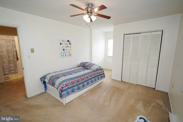 20560 Nanticoke Rd, Nanticoke, MD 21840 - carpeted bedroom with a closet, baseboards, and a ceiling fan