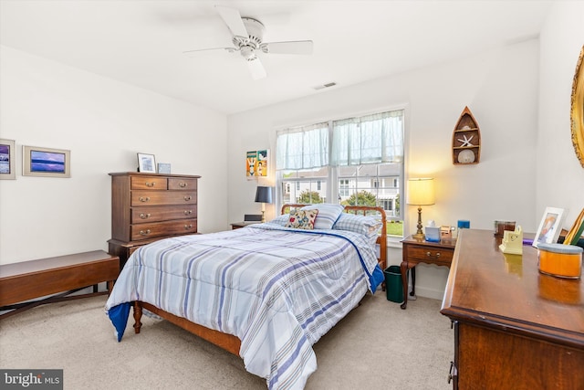 201 Henrys Mill Dr, Berlin, MD 21811 - bedroom with light colored carpet and a ceiling fan