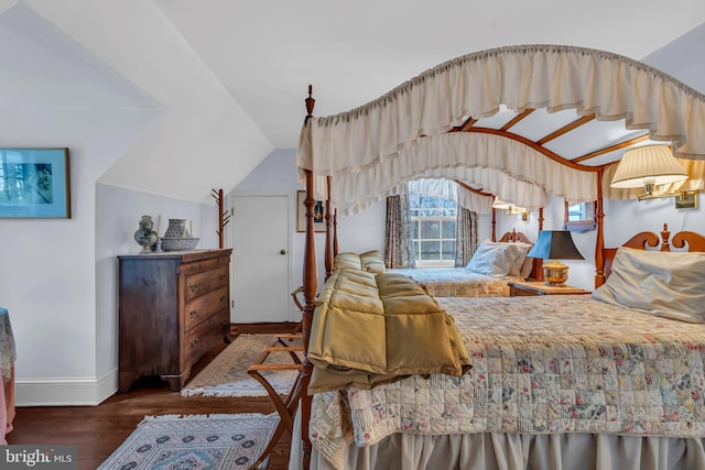 607 Rosedale Rd, Princeton, NJ 08540 - bedroom with baseboards, wood finished floors, and lofted ceiling