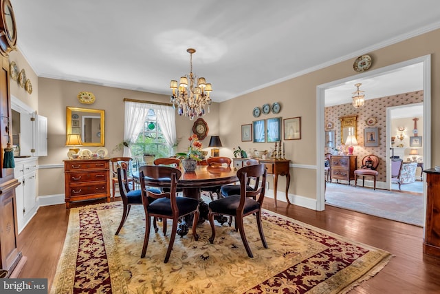 607 Rosedale Rd, Princeton, NJ 08540 - dining area with a chandelier, wood finished floors, crown molding, and baseboards