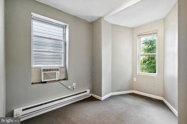 unfurnished room featuring baseboard heating, baseboards, and carpet floors