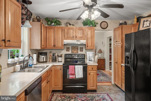 kitchen featuring black appliances, under cabinet range hood, a sink, a ceiling fan, and light countertops