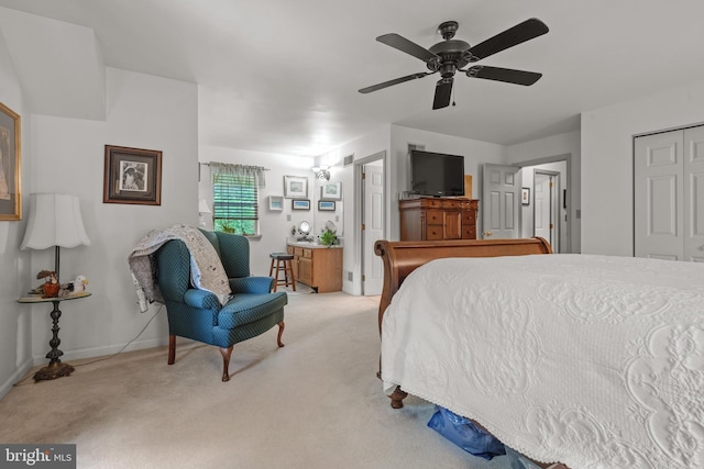 bedroom featuring carpet flooring, baseboards, ceiling fan, and a closet