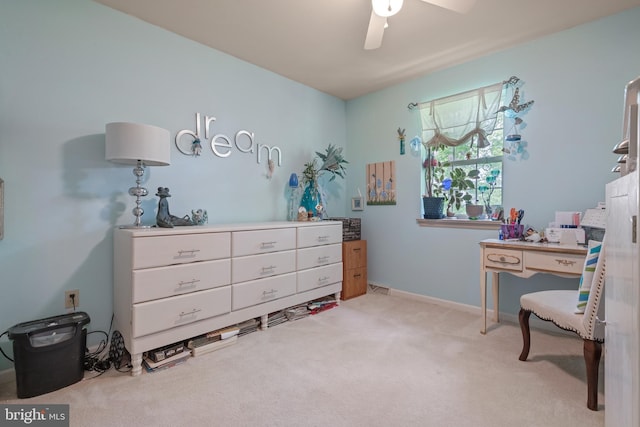 bedroom with light carpet, a ceiling fan, and baseboards