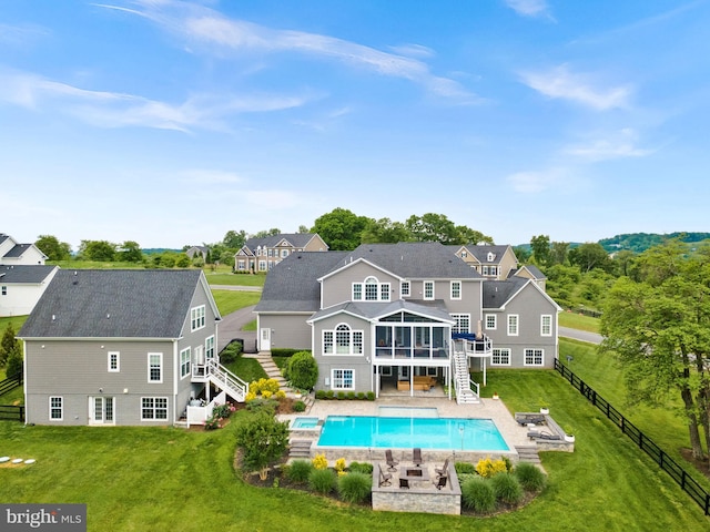 16024 Waterford Crest Pl, Paeonian Springs, VA 20129 - back of house featuring stairway, a wooden deck, an outdoor pool, a sunroom, and a residential view