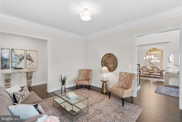 16024 Waterford Crest Pl, Paeonian Springs, VA 20129 - living room featuring ornamental molding, a chandelier, wood finished floors, and baseboards