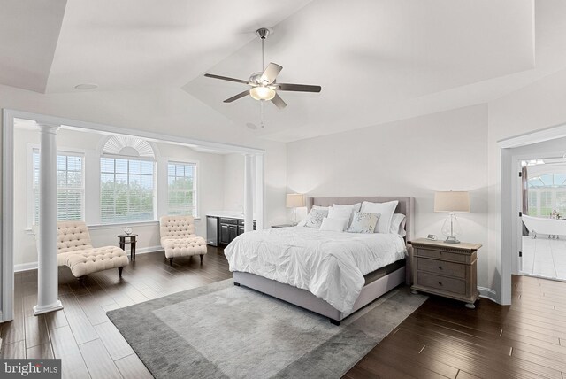16024 Waterford Crest Pl, Paeonian Springs, VA 20129 - bedroom featuring multiple windows, baseboards, decorative columns, dark wood finished floors, and lofted ceiling