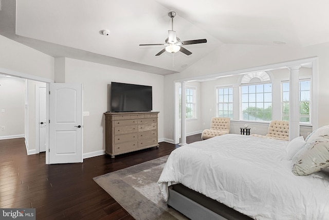 16024 Waterford Crest Pl, Paeonian Springs, VA 20129 - bedroom with vaulted ceiling, dark wood finished floors, baseboards, ceiling fan, and decorative columns