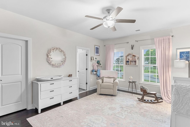 16024 Waterford Crest Pl, Paeonian Springs, VA 20129 - living area featuring a ceiling fan, baseboards, and dark wood-style flooring