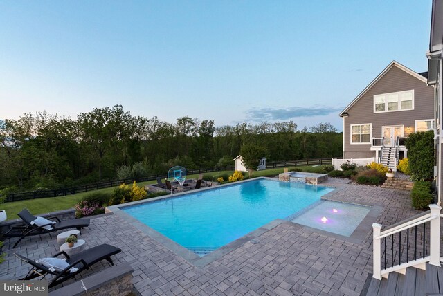 16024 Waterford Crest Pl, Paeonian Springs, VA 20129 - view of pool with a pool with connected hot tub, stairway, a fenced backyard, and a patio area