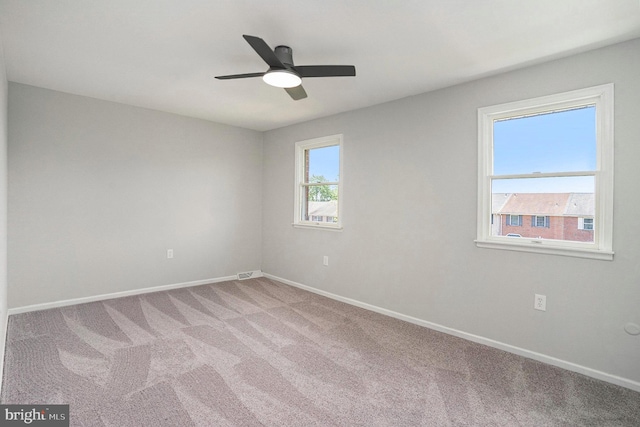 748 Jefferson St, Red Hill, PA 18076 - empty room with light carpet, baseboards, and ceiling fan