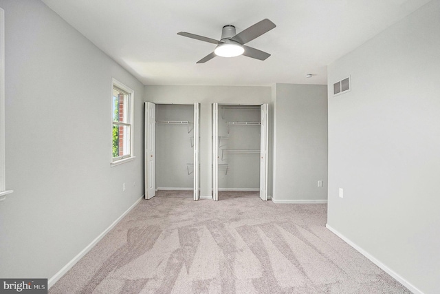 748 Jefferson St, Red Hill, PA 18076 - unfurnished bedroom with multiple closets, baseboards, carpet floors, and a ceiling fan