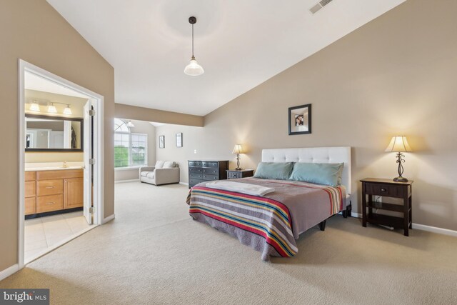 22615 Upperville Heights Sq, Ashburn, VA 20148 - bedroom featuring carpet flooring, vaulted ceiling, baseboards, ensuite bathroom, and a sink