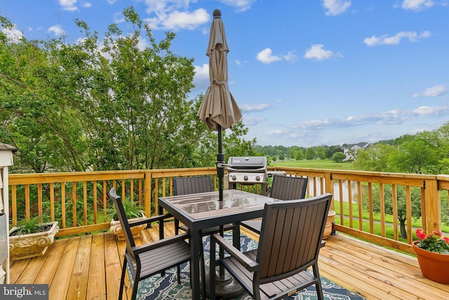 22615 Upperville Heights Sq, Ashburn, VA 20148 - wooden deck featuring outdoor dining area, a grill, and view of scattered trees