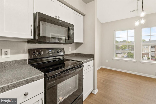 2400 Dominion Dr Unit 3D, Frederick, MD 21702 - kitchen with black appliances, baseboards, white cabinets, and light wood-type flooring