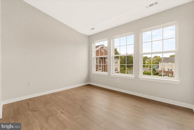 2400 Dominion Dr Unit 3D, Frederick, MD 21702 - unfurnished room featuring wood finished floors, baseboards, and vaulted ceiling