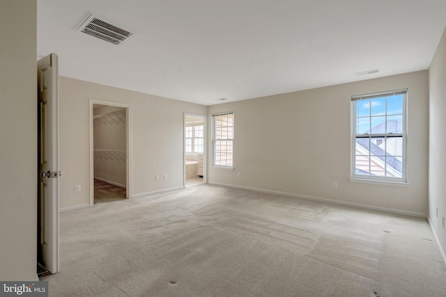 42522 Neighborly Ln, Chantilly, VA 20152 - empty room featuring healthy amount of natural light, carpet flooring, and baseboards