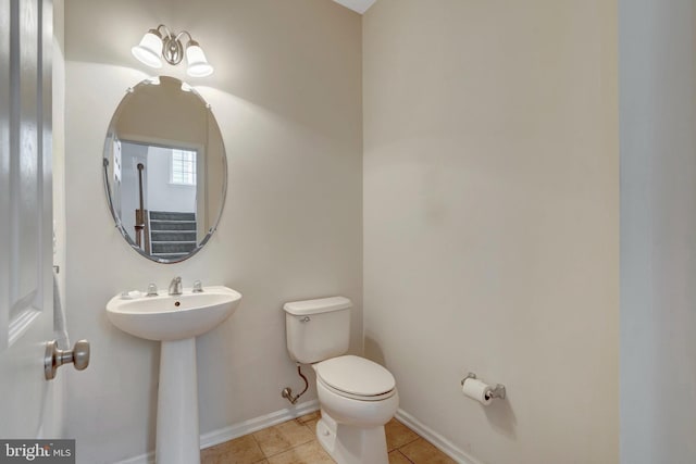 42522 Neighborly Ln, Chantilly, VA 20152 - bathroom with toilet, tile patterned floors, baseboards, and a sink