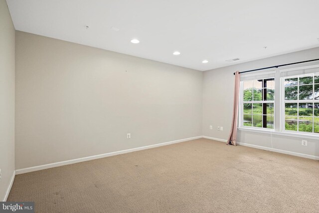 10016 Love Song Ct, Laurel, MD 20723 - empty room with baseboards, light colored carpet, and recessed lighting