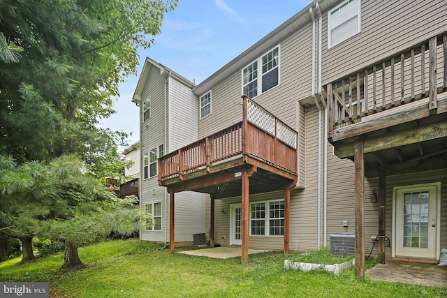 10016 Love Song Ct, Laurel, MD 20723 - rear view of house featuring a patio, a yard, central air condition unit, and a deck