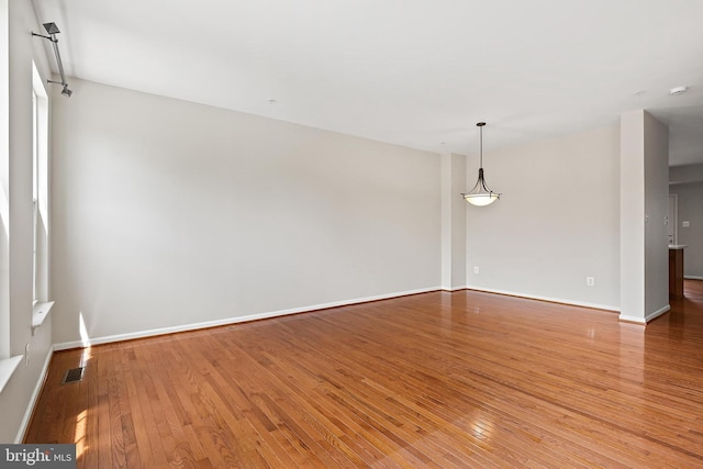 10016 Love Song Ct, Laurel, MD 20723 - unfurnished room featuring hardwood / wood-style flooring, baseboards, and a smoke detector