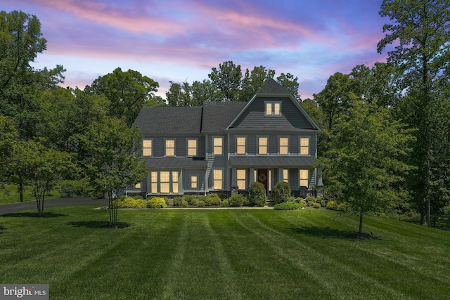133 Greentree Farm Dr, Dickerson, MD 20842 - view of front of home with a standing seam roof, a front lawn, and metal roof