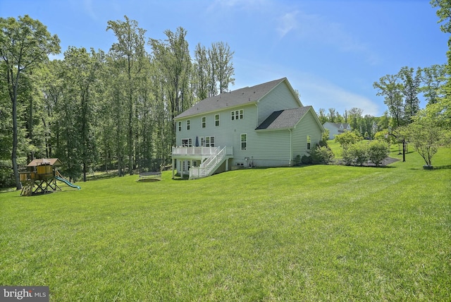 133 Greentree Farm Dr, Dickerson, MD 20842 - back of property featuring a playground, a yard, a deck, and stairs
