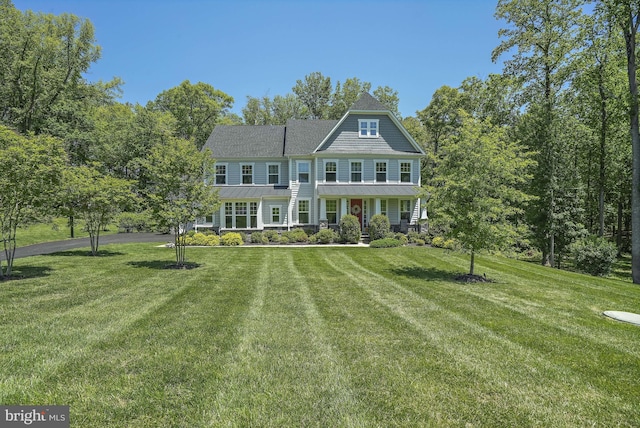 133 Greentree Farm Dr, Dickerson, MD 20842 - view of front of property with a standing seam roof, a front lawn, metal roof, and roof with shingles