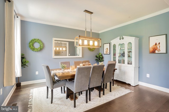 133 Greentree Farm Dr, Dickerson, MD 20842 - dining area with crown molding, dark wood-style floors, and baseboards