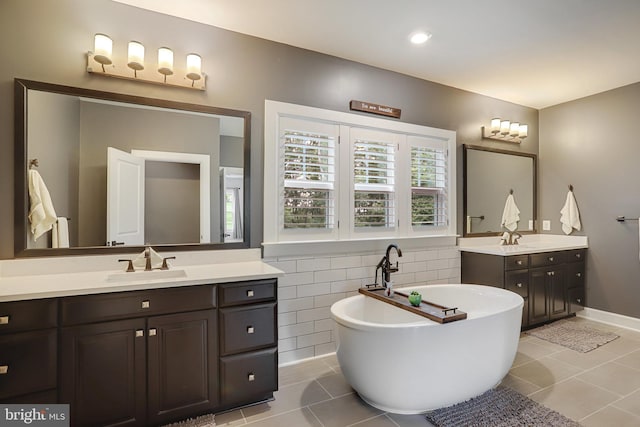 133 Greentree Farm Dr, Dickerson, MD 20842 - full bath with two vanities, a freestanding bath, and tile patterned flooring