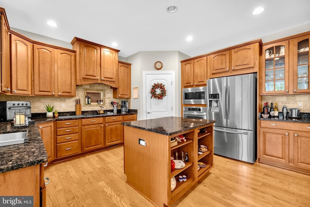 2906 Cornus Way, Joppa, MD 21085 - kitchen with appliances with stainless steel finishes, light wood finished floors, tasteful backsplash, brown cabinets, and recessed lighting