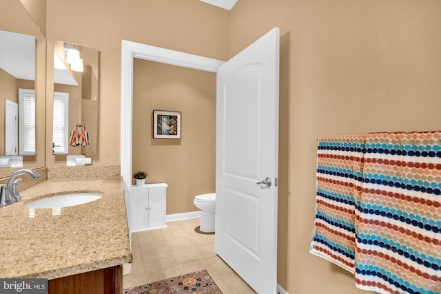 2906 Cornus Way, Joppa, MD 21085 - bathroom with vanity, toilet, tile patterned floors, and baseboards