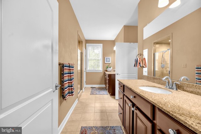 2906 Cornus Way, Joppa, MD 21085 - bathroom featuring a stall shower, vanity, tile patterned floors, and baseboards