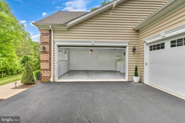 2906 Cornus Way, Joppa, MD 21085 - garage with driveway and washer and dryer