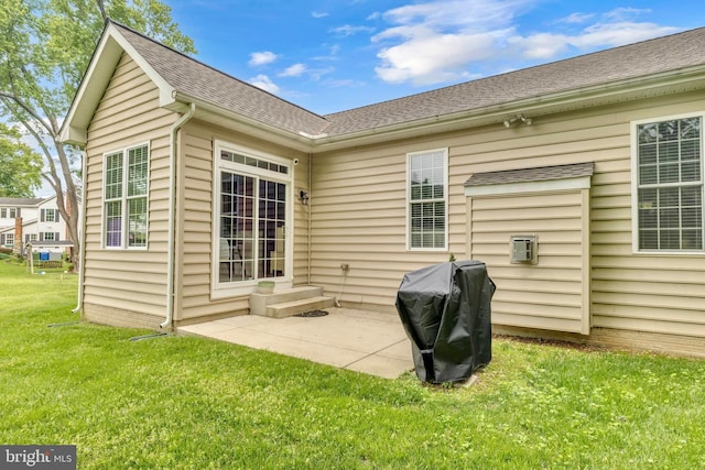 2906 Cornus Way, Joppa, MD 21085 - rear view of house featuring roof with shingles, a yard, and a patio area